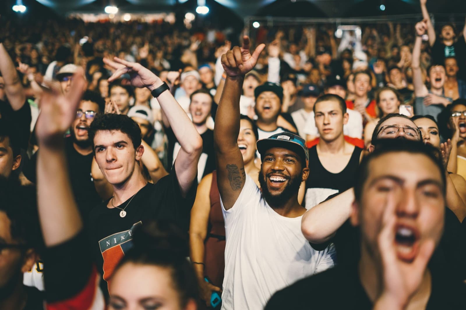A crowd cheering at a live event