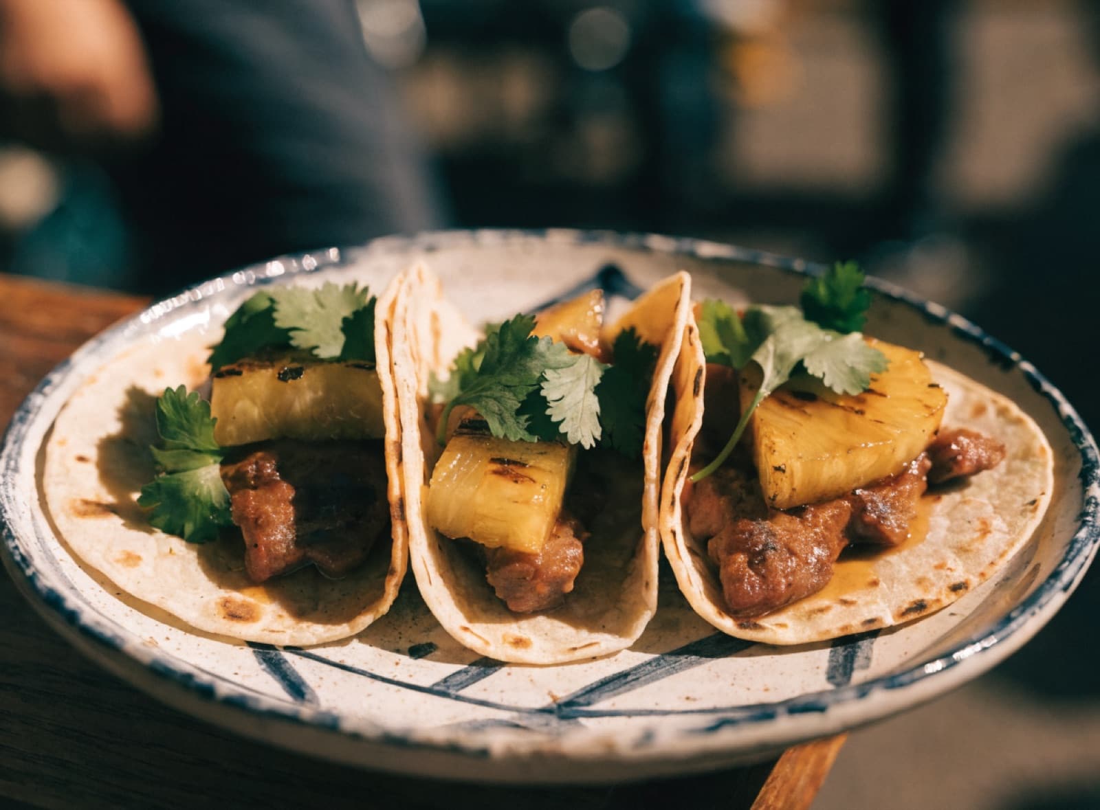 Illustration: tacos al pastor on a ceramic plate